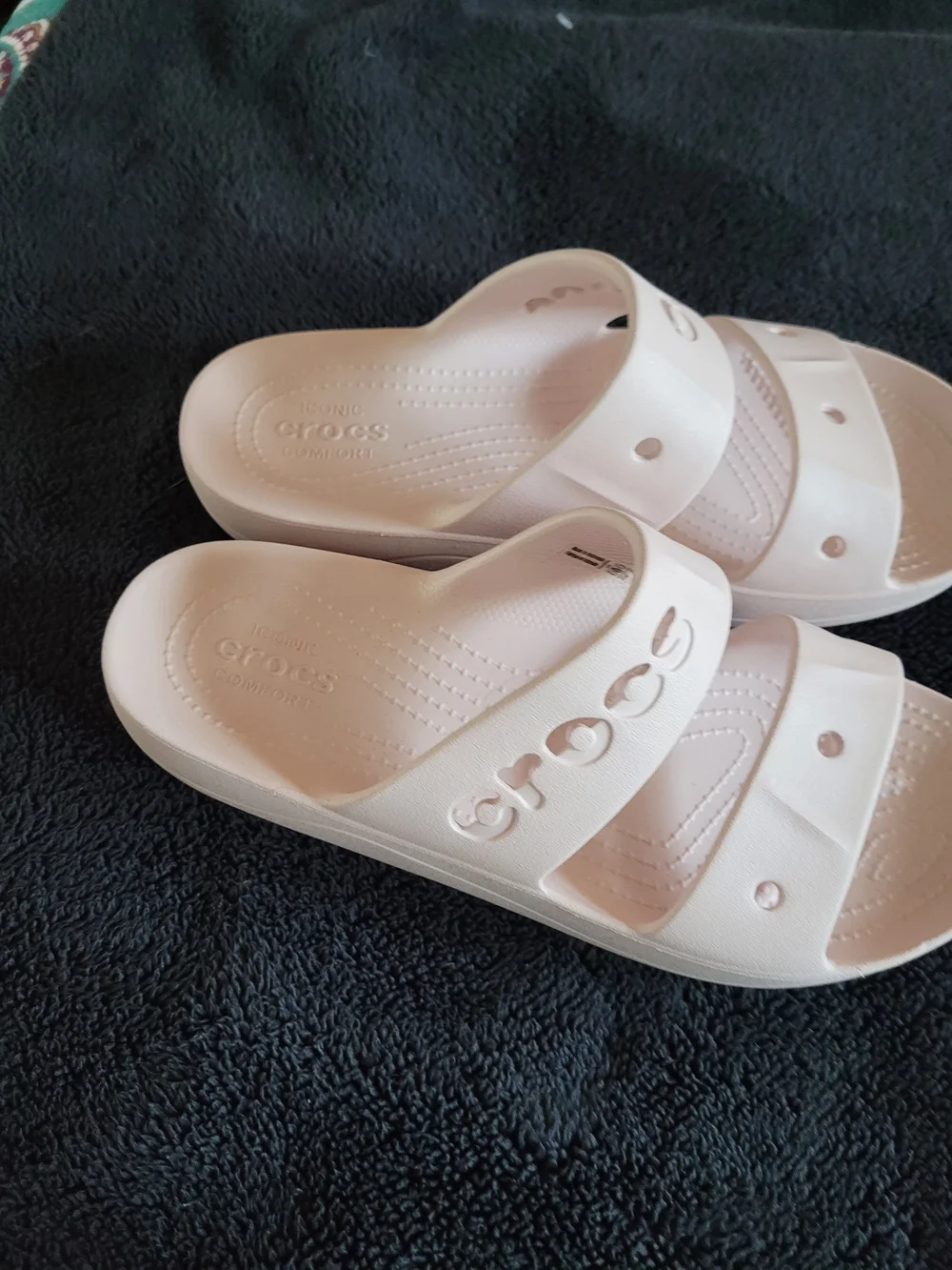 Crocs Slide Sandals in Light Pink